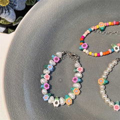 Korea new colorful flower bracelet sweet girly style shaped pearl adjustable string hand accessories