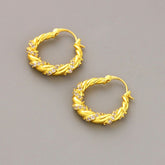 French light luxury copper plated real gold fashion micro inset zircon twist winding designer niche high-grade earring buckle